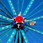 A retired North Carolina repairman built giant wind-powered sculptures from scrap; after 30 were moved downtown, the park drew 194,300 visitors and generated $5.3 million in regional sales