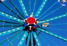 A retired North Carolina repairman built giant wind-powered sculptures from scrap; after 30 were moved downtown, the park drew 194,300 visitors and generated $5.3 million in regional sales