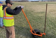 A New York highway superintendent built a snow-fence pole remover from an old golf-cart wheel and scrap box tubing for $0; it cut a three-week job to about 1.5 weeks and has now won a national federal award
