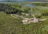 A 558-acre Wyoming ranch sat unsold for 14 months even after its price fell from nearly $20 million to $15 million; when owners scheduled a no-reserve auction, a buyer made an offer before bidding even began