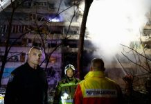 Woman killed, 3 injured as Russian attack hits Kyiv residential building, subway station