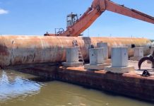 Mississippi sank a 31-ton propane tank and steel tower once used to train firefighters 13 miles offshore, turning old equipment into a long-lasting artificial reef for Gulf fish
