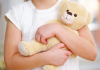 Psychology says children who carry the same toy from room to room may be seeking more than entertainment
