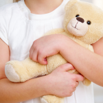 Psychology says children who carry the same toy from room to room may be seeking more than entertainment