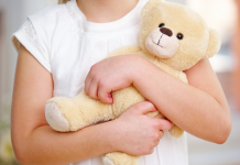 Psychology says children who carry the same toy from room to room may be seeking more than entertainment